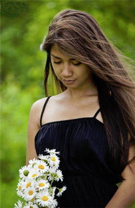 Woman Grasping Flowers