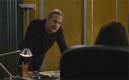 Jeff Daniels Leaning On Desk